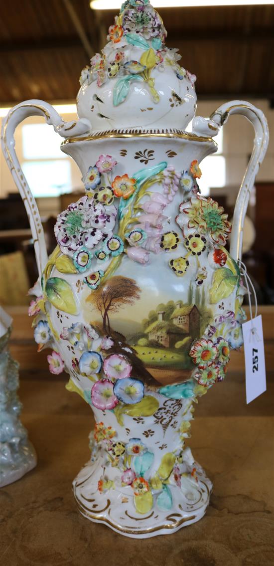 A Coalbrookdale flower and brass bound vase and cover